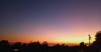 Sunset from the deck overlooking town and the ocean.