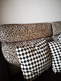 Filthy sofa covered in stains & mould on seats