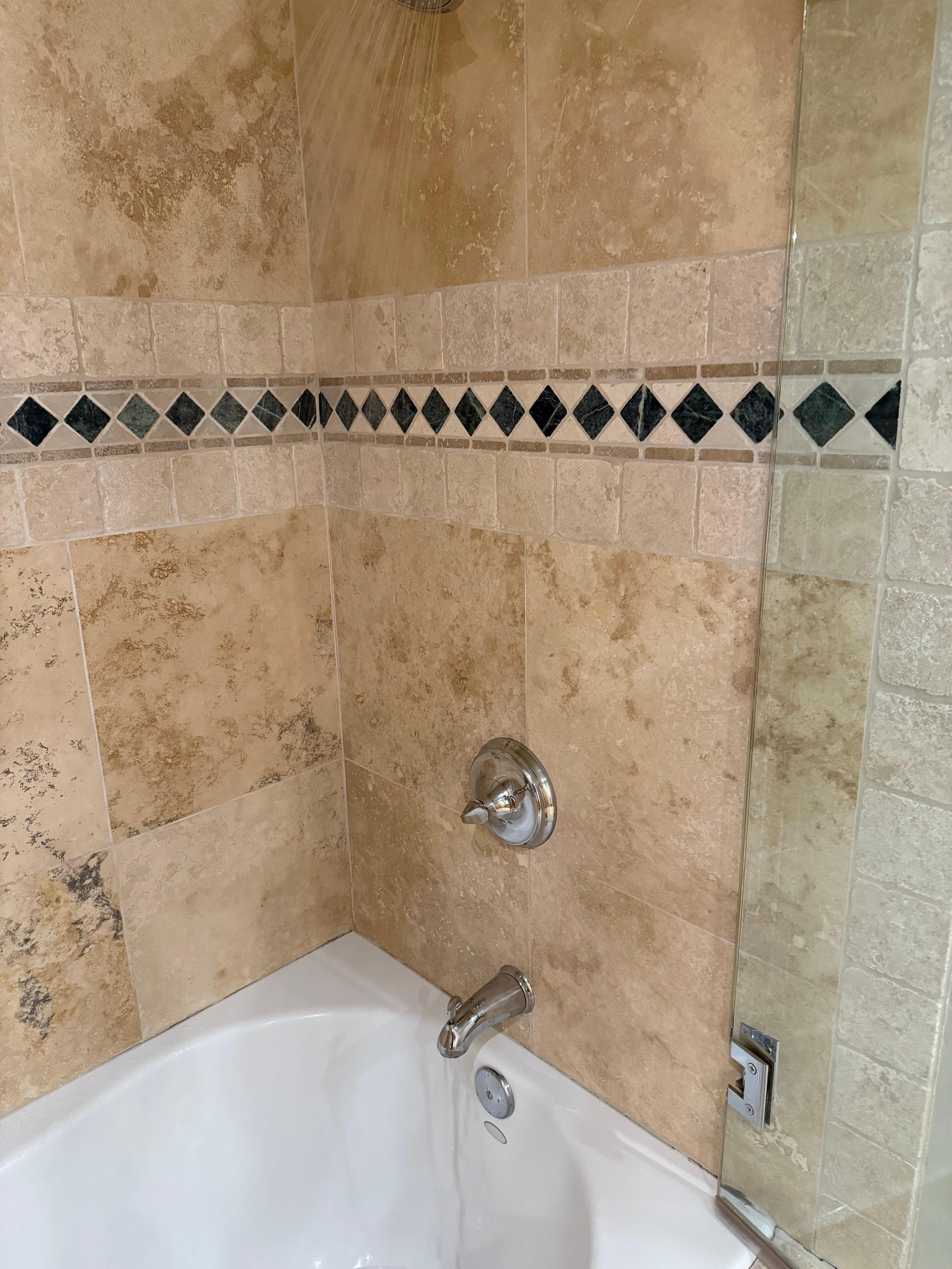 Shower was half shower half foot bath. Lol