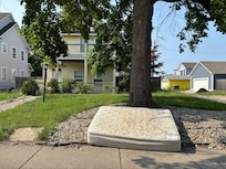 House in front of carriage house. While the carriage house is in the rear, this is what you see when you first arrive.