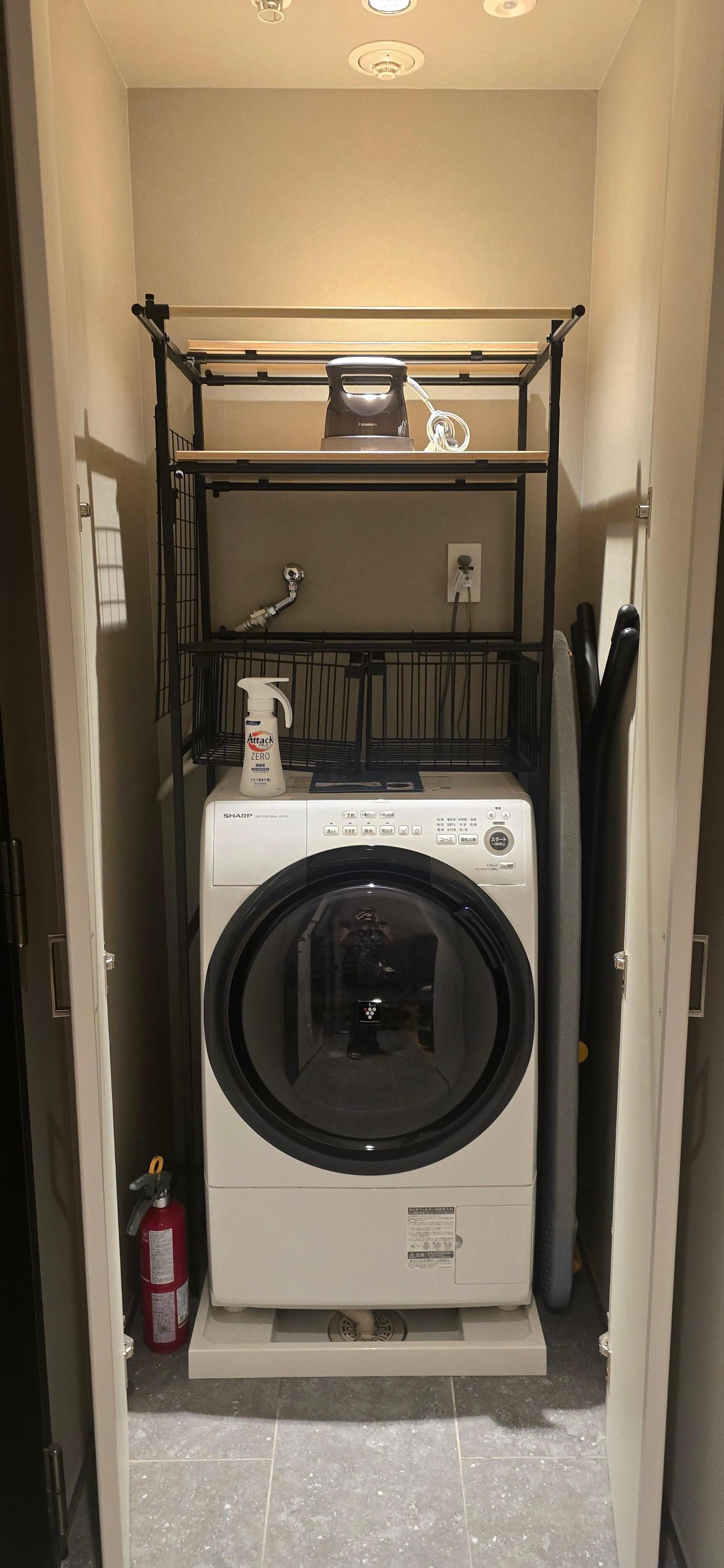 The washing machine, just google the panel in English with model of machine, or read the card directions in the room. Also enjoy provided laundry soap if your in the deluxe studio. 