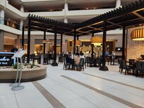 Restaurant area. Offered 2 free drinks per person during happy hour, and light cheese/cracker snacks. Food on menu was very good, and reasonable $.