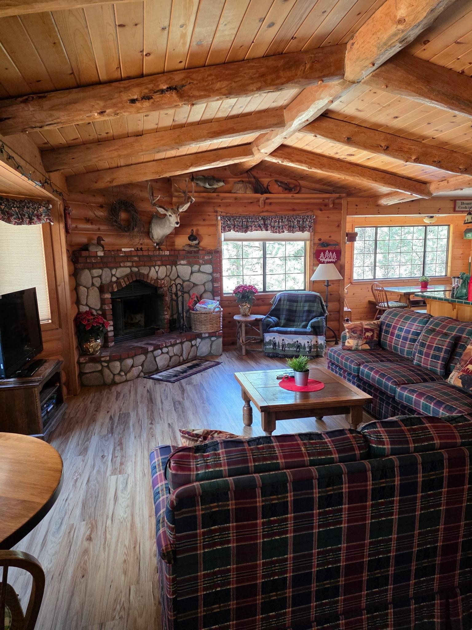 Walking through the front door leading directly into the living room