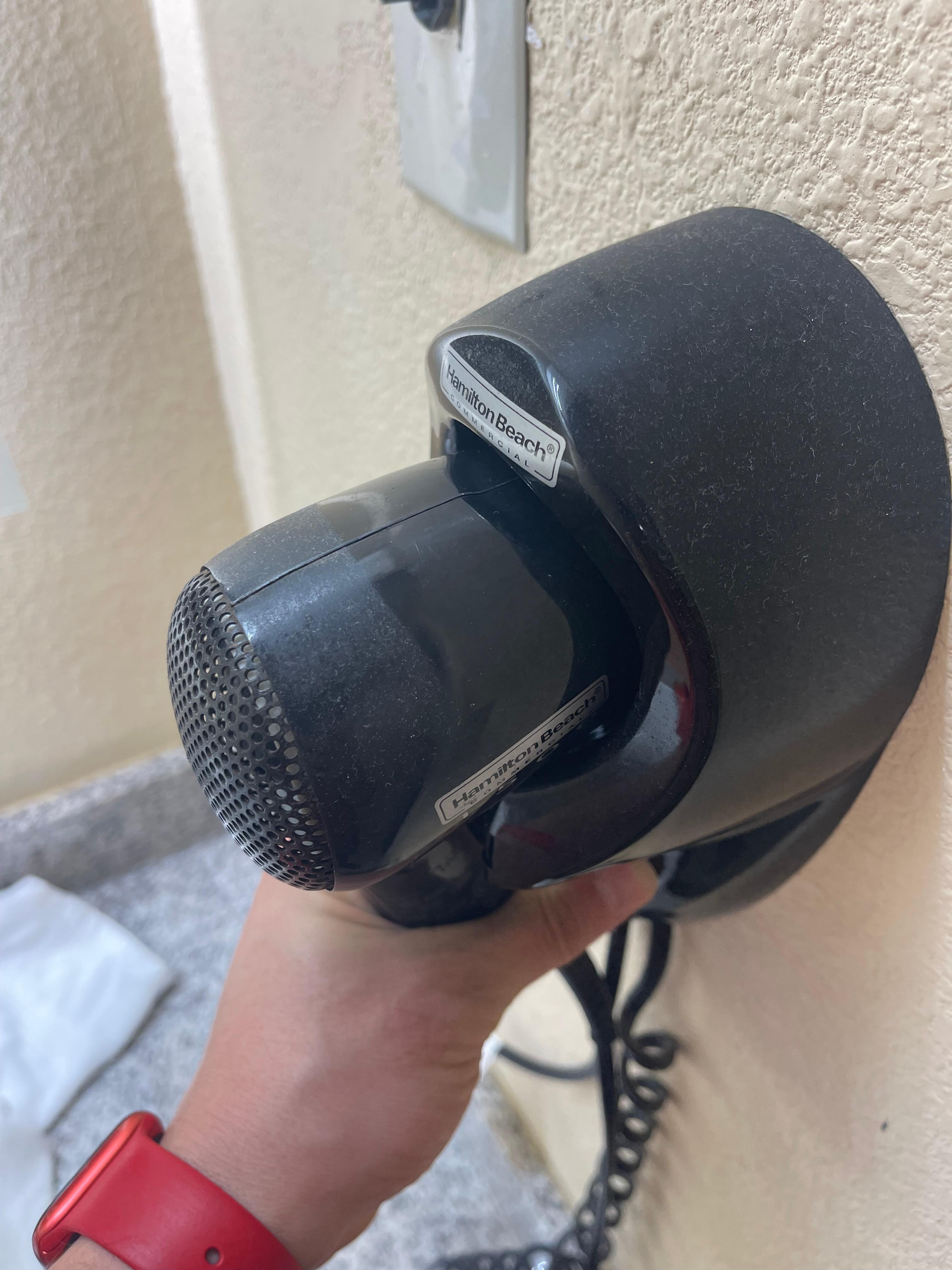 Clear signs that the hairdryer hasn’t been cleaned in a while. 