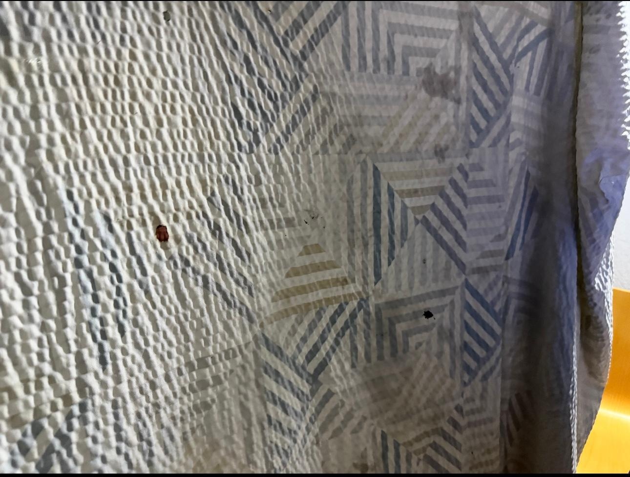 Multiple cig burned holes and stains on filthy beadspreads