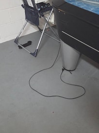 Air hockey was unplugged and there were no outlets that you were able to reach with it in order to actually use the table