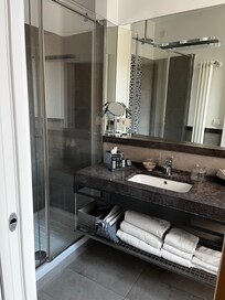 Bathroom is very clean and modern.
