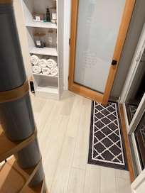 Door to the bedroom accessed through the laundry room.