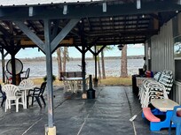 Perfect Outdoor Living Space and this picture doesn't even do it justice!!! When it is lit up during the evening....it is perfection!!