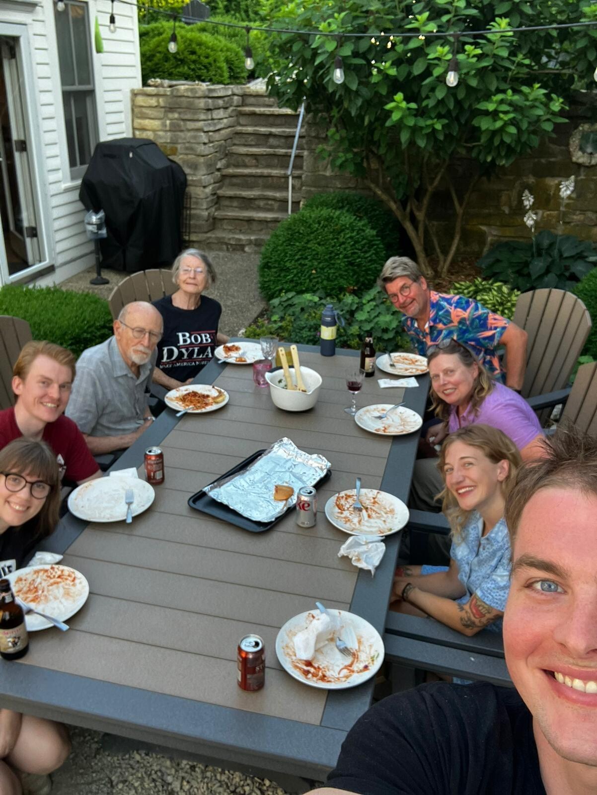 At the beautiful side yard with a big enough table for all of us!