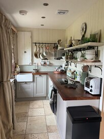 Great kitchen! Love the hot water tap.