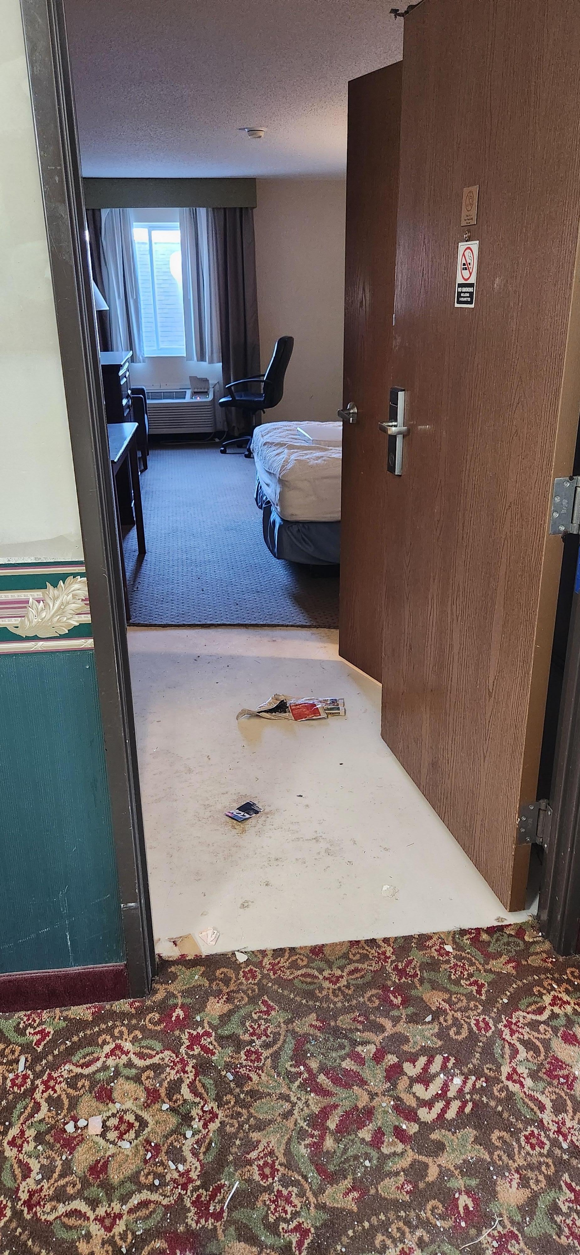 This room across from our room door remained open for our entire stay. Trash on the floor, no attempt by anyone to clean up. 