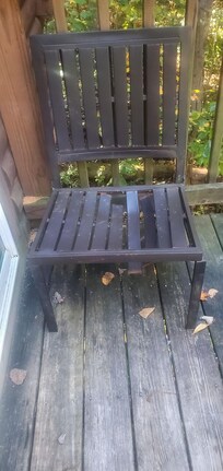 Metal chair with broken slats
