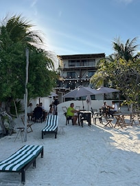 View from the beach. We stayed in a room on the second floor and slept with open doors towards the sea