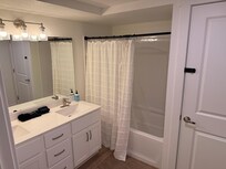 Main kind bedroom designated bathroom