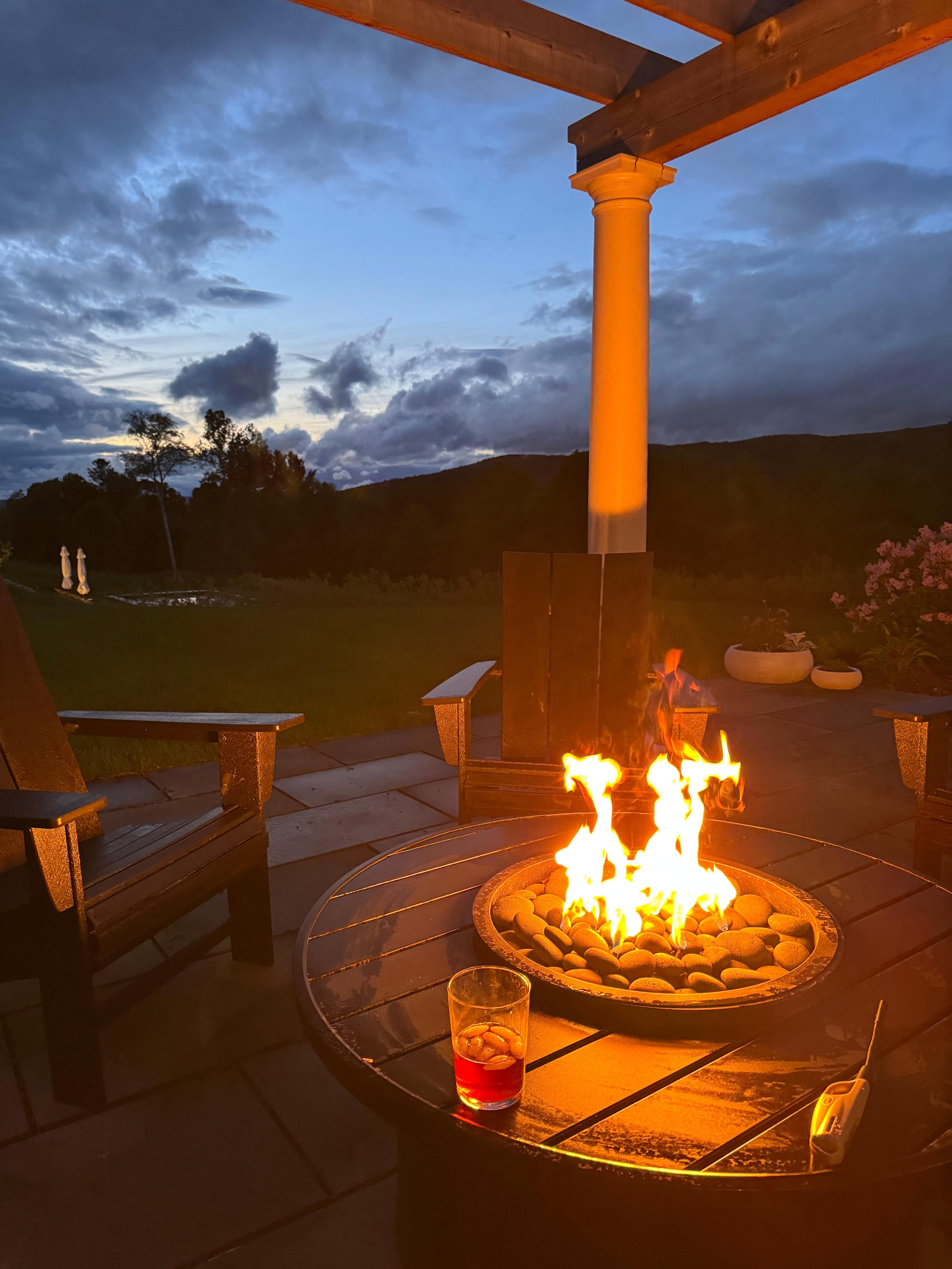 fire pit at night under the pergola 