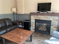 Living room with thermostat control fireplace.  Was nice on a cool evening