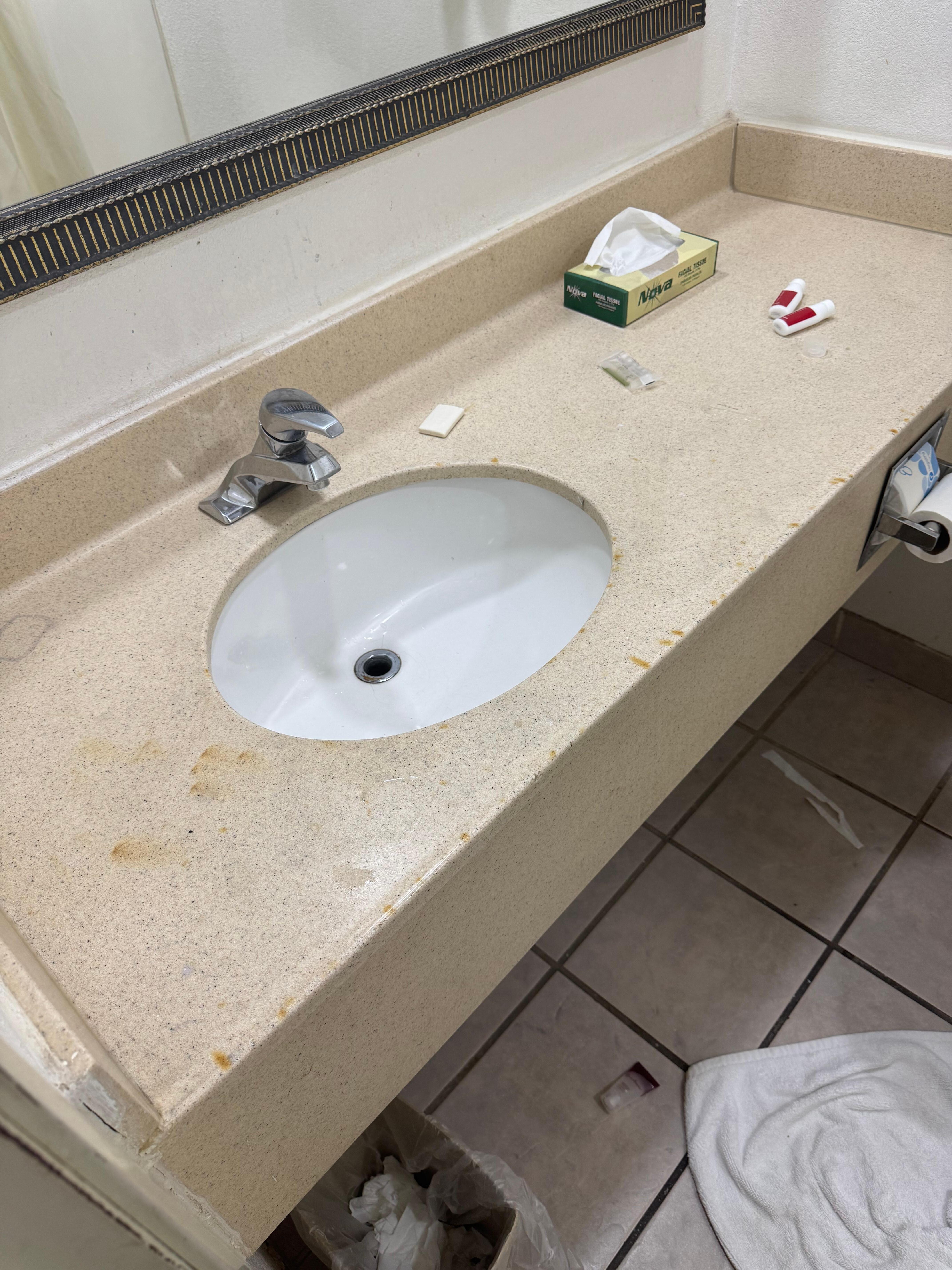 Burn marks on the countertop in the bathroom 