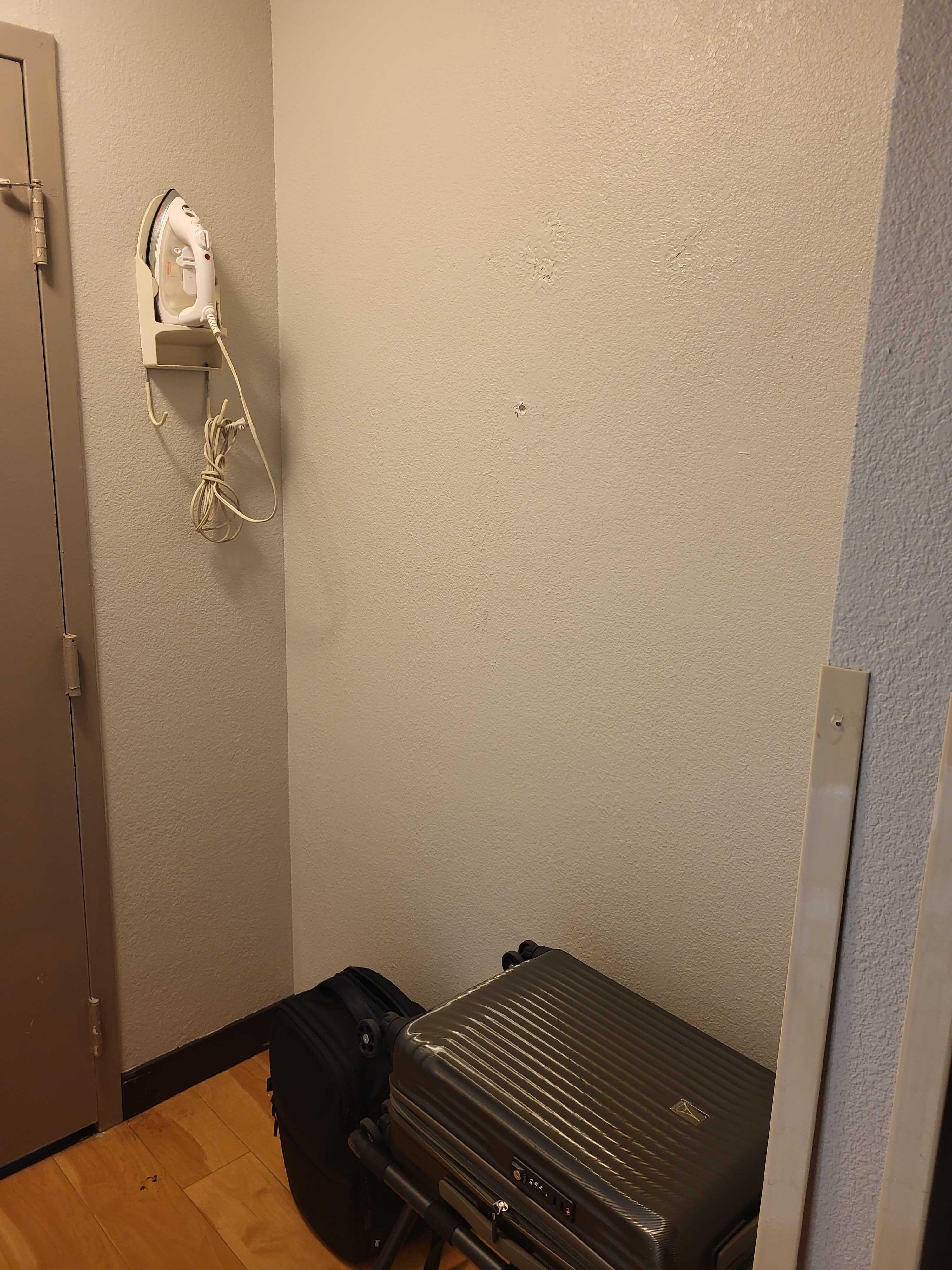Hall - no where to hang clothes + hole