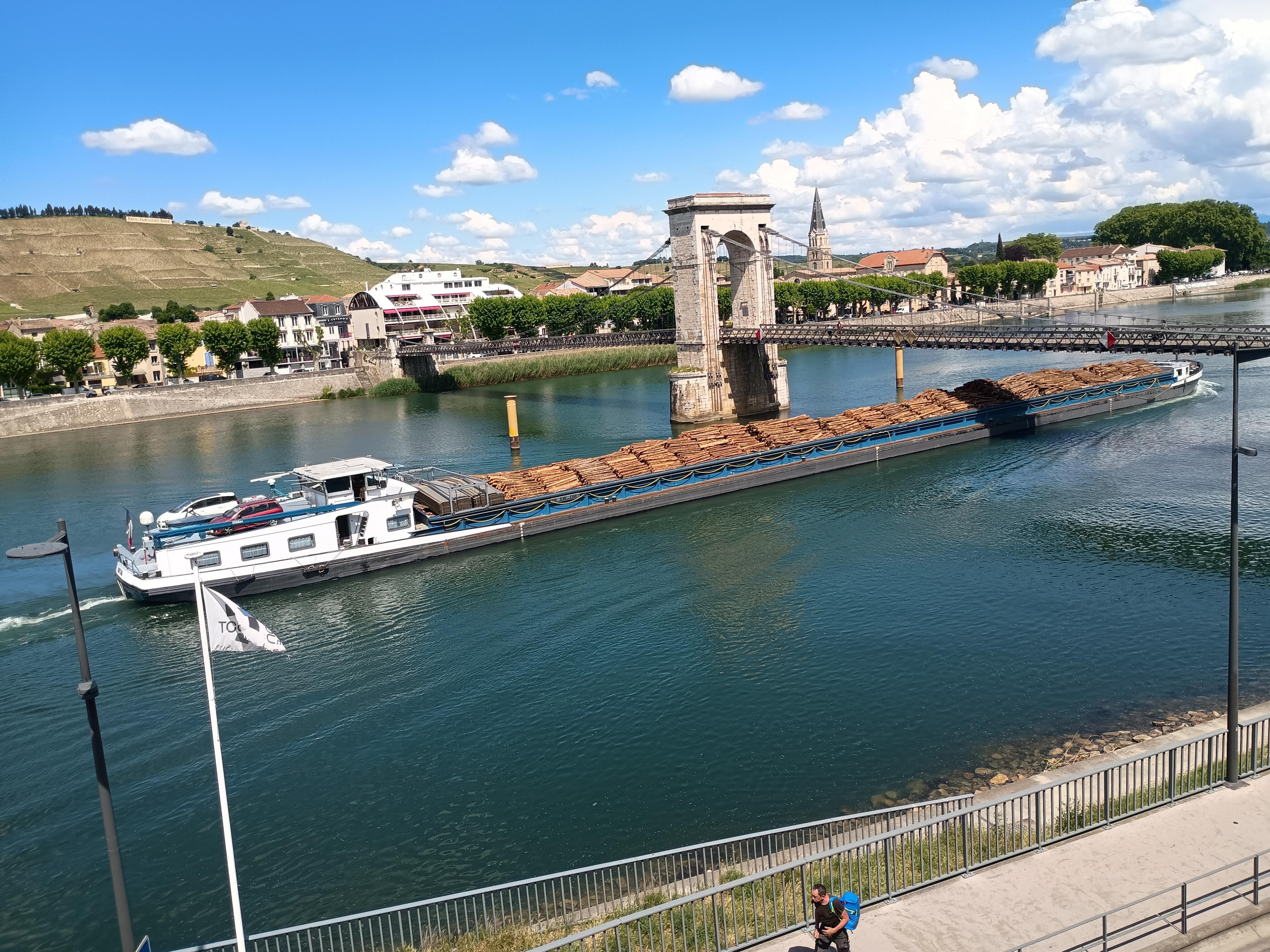View from our room over river and footbridge to Tain l'Hermitage