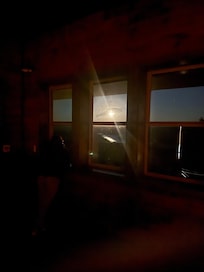 The bright moon looking out the top floor master bedroom