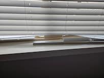 Bottom of blinds was severed in two places in one bedroom