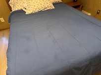 Stained comforter in one of the bedrooms