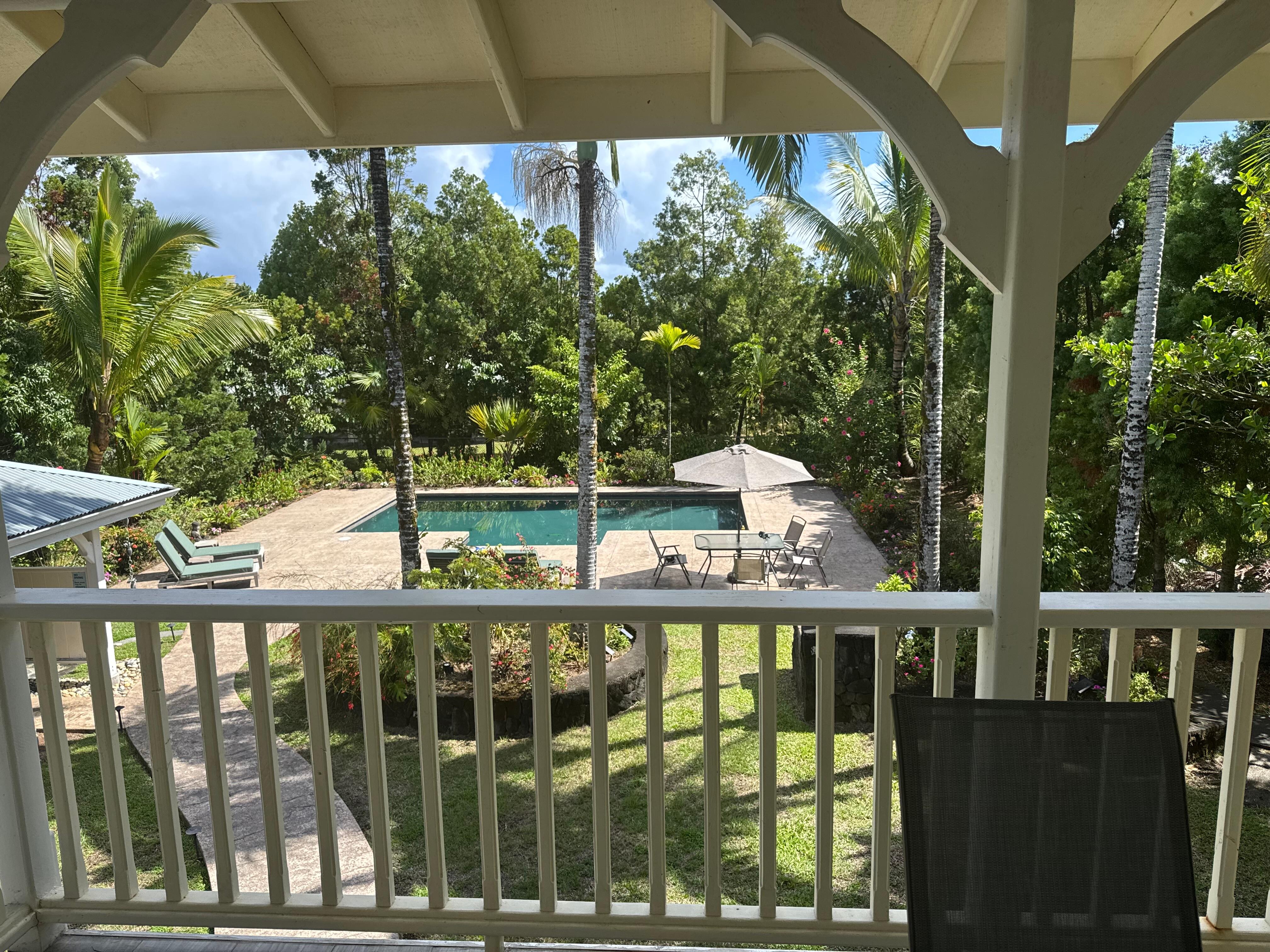 View of backyard from the upstairs balcony. 
