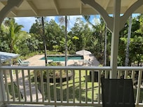 View of backyard from the upstairs balcony.