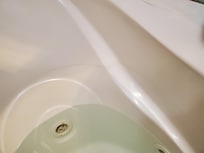 Ring left in jacuzzi from running jets.