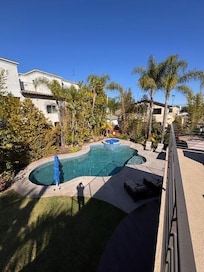 View of pool from upper patio deck