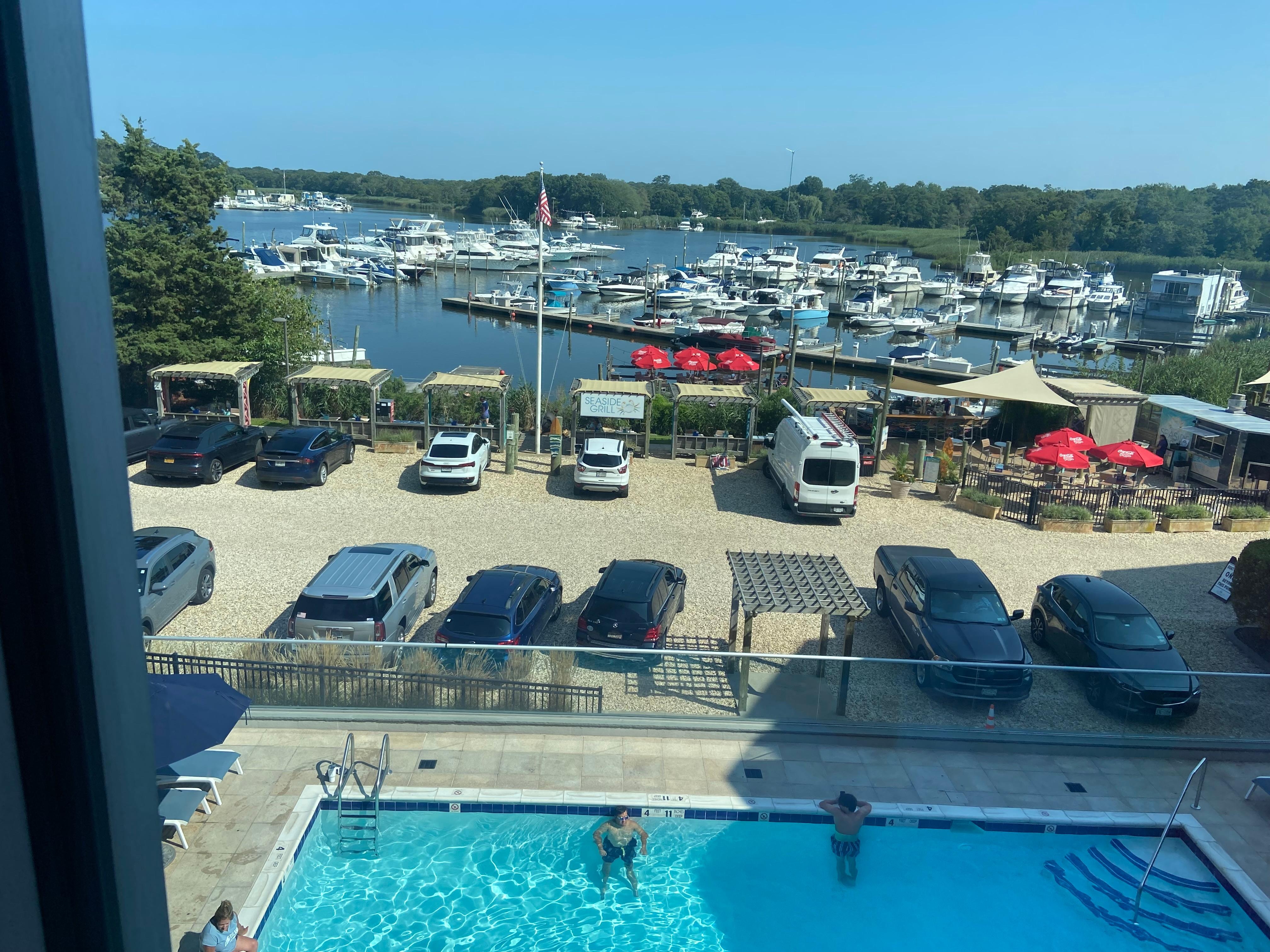 Hyatt Outdoor pool with the yachts and boats at anchor  