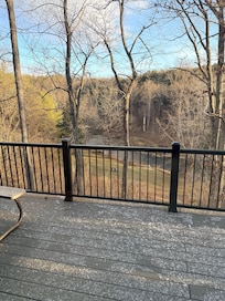 Enjoy the rustling of the creek from the back deck