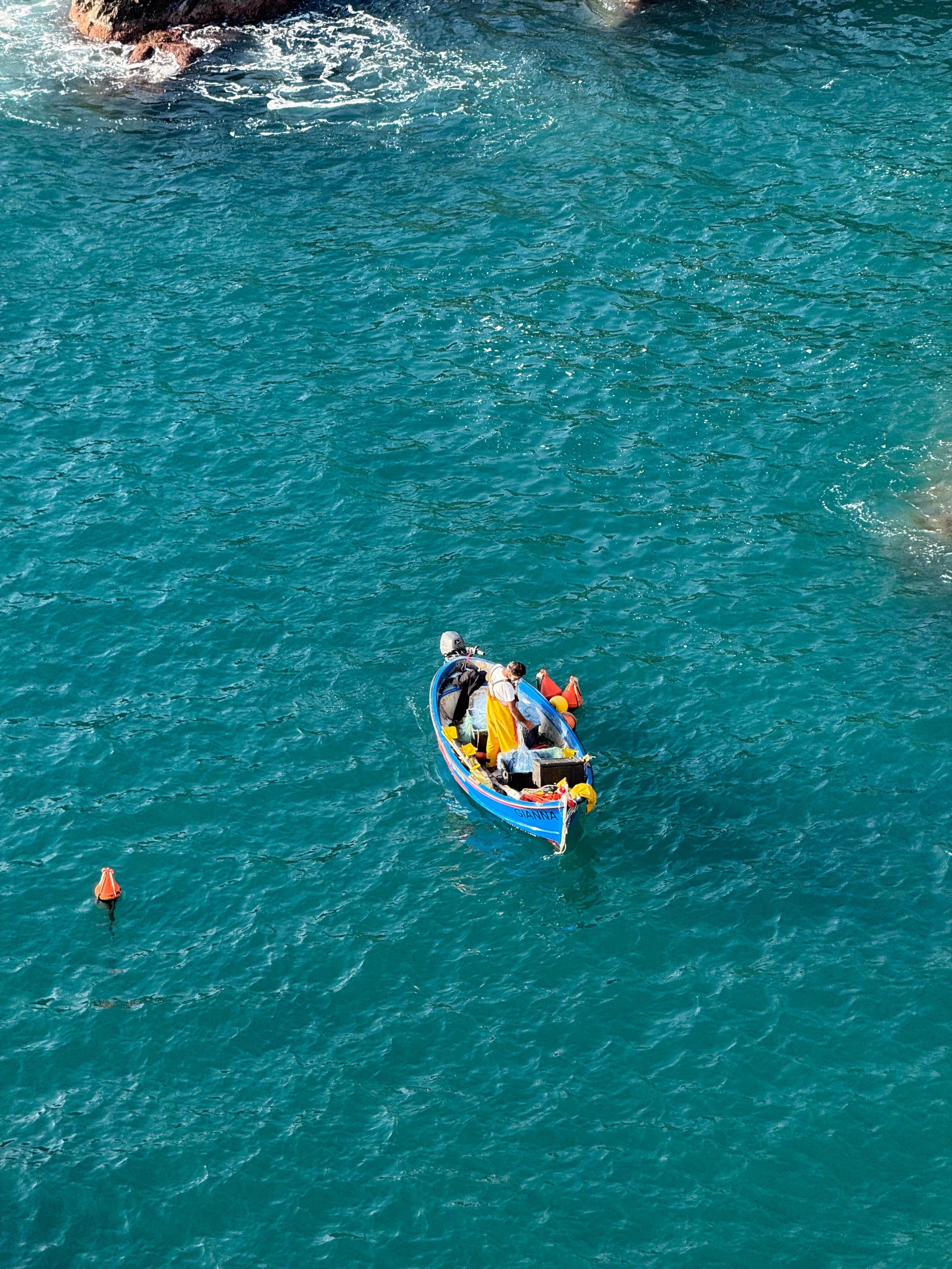 Fishermen in the Marina as viewed from the deck
