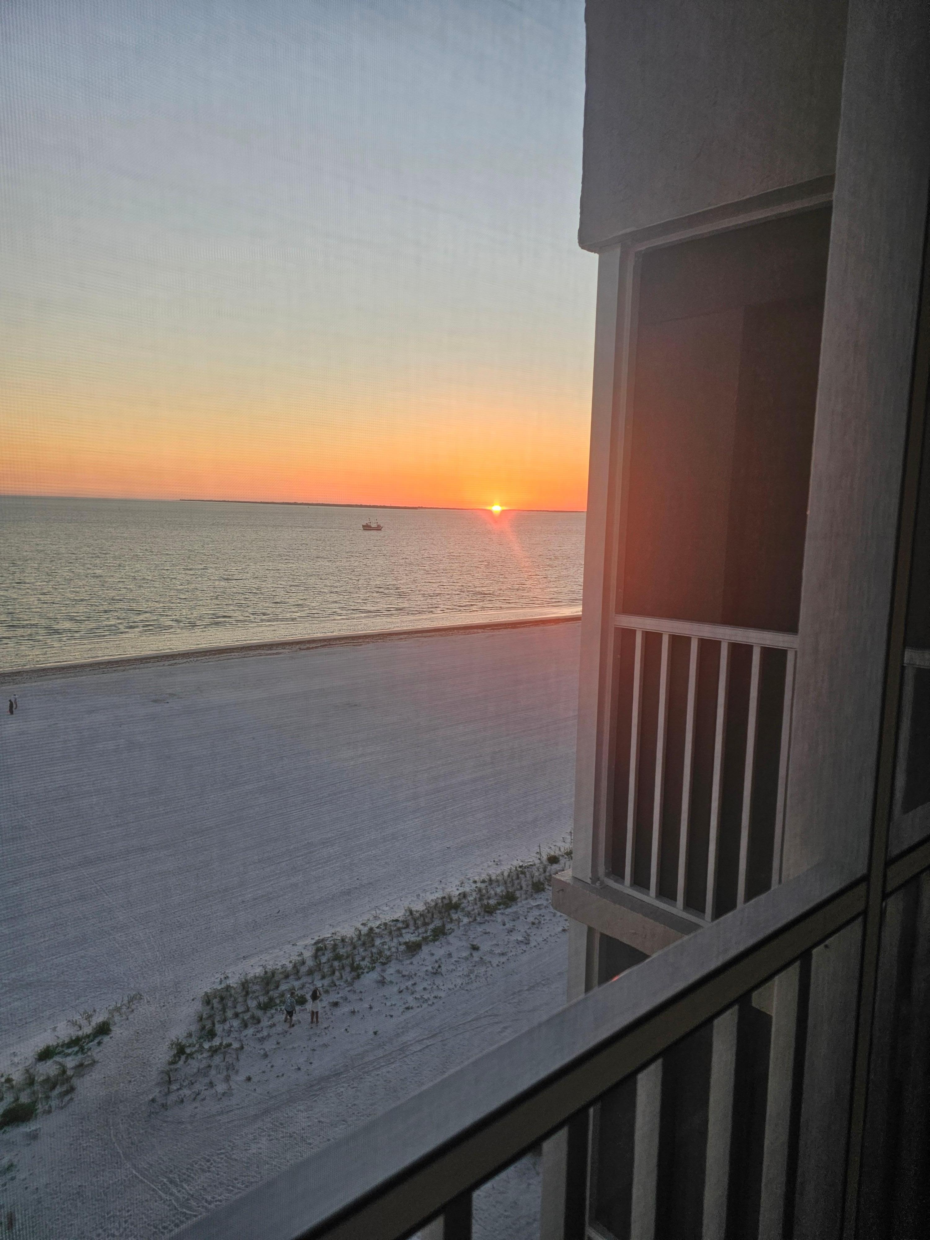 Sunset from our 8th floor balcony.