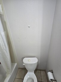 actual hole in the wall filled with just a plastic grocery bag