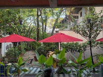 View of the fish pond and courtyard from the breakfast area