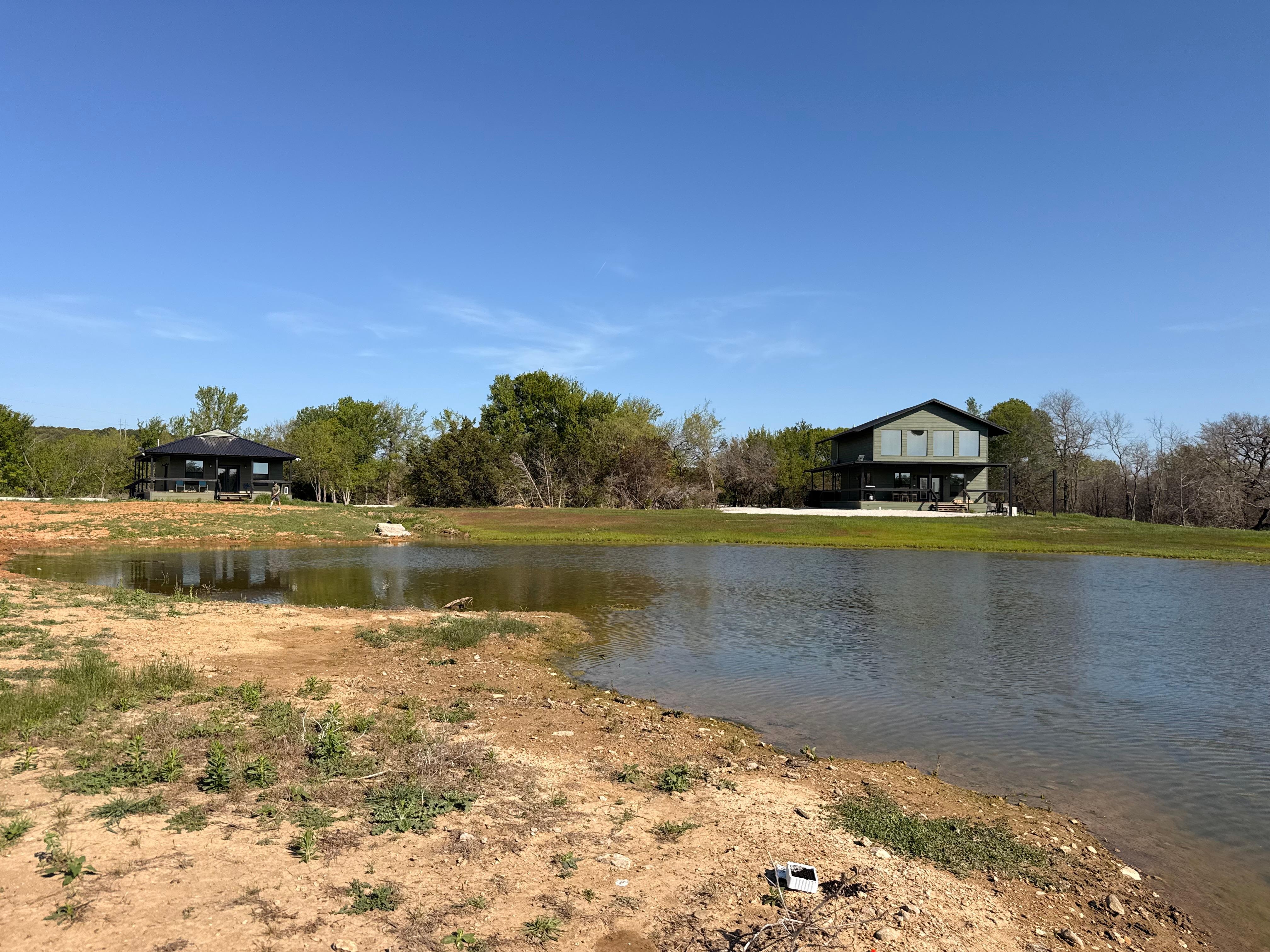 The pond in front of the house. 