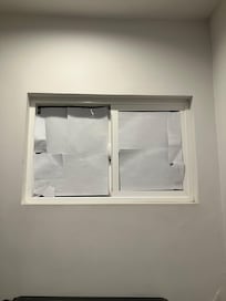 Window in room with no curtain. There are bushes outside, but no way to tell if someone is looking in at night. Front desk gave me paper and tape to cover it. Maybe just get some curtains?