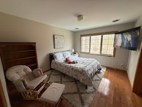 Excited about sharing a room with her sister.