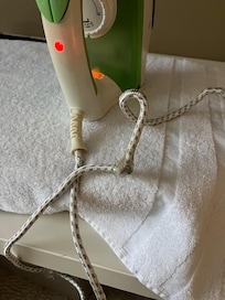 Power cord held together with sticky tape