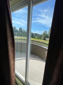 Glass door to private balcony.
