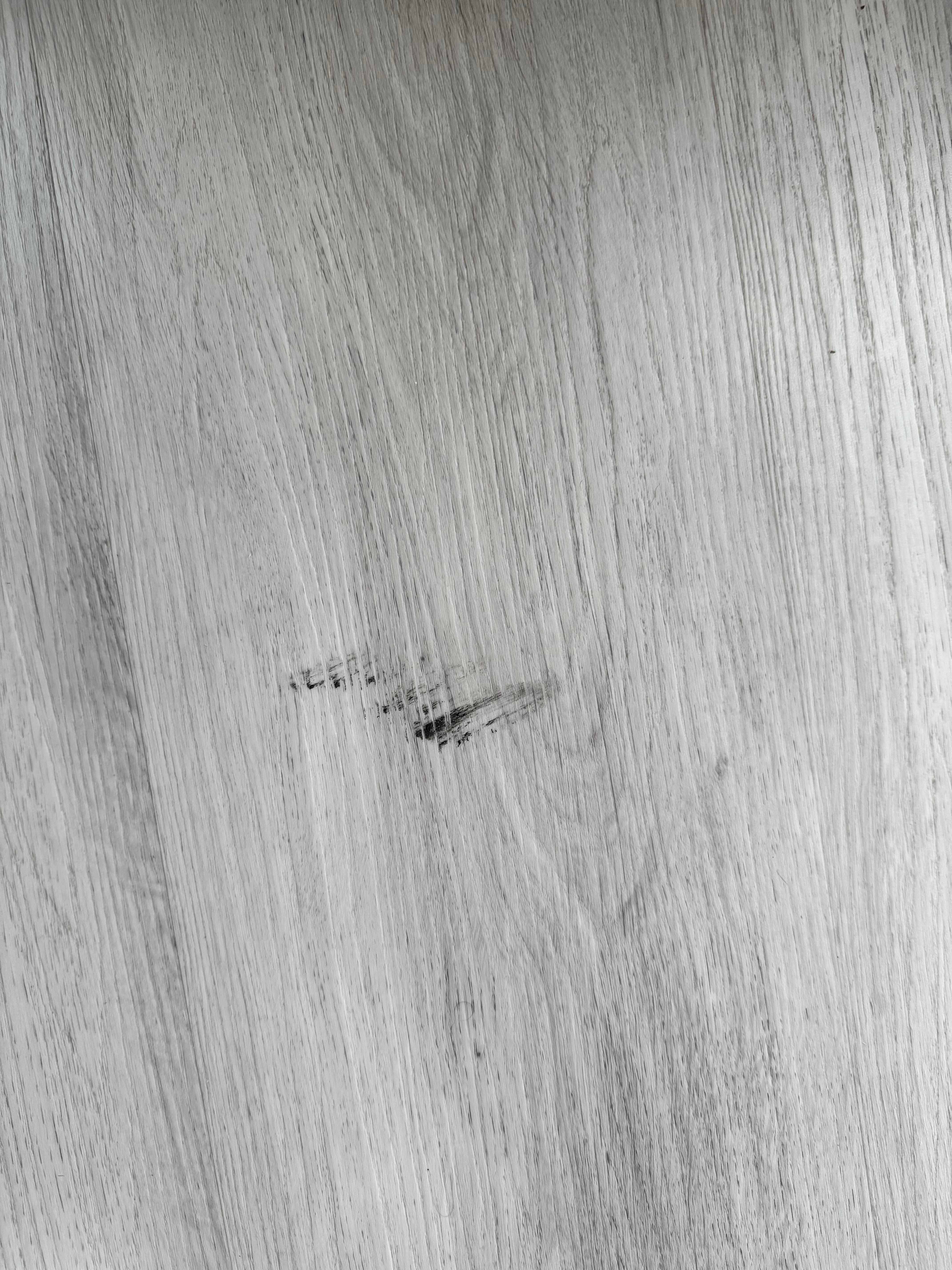 Black stuff on the floor 