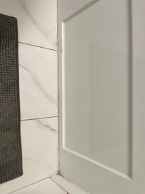 Dirty floor and water damaged grout
