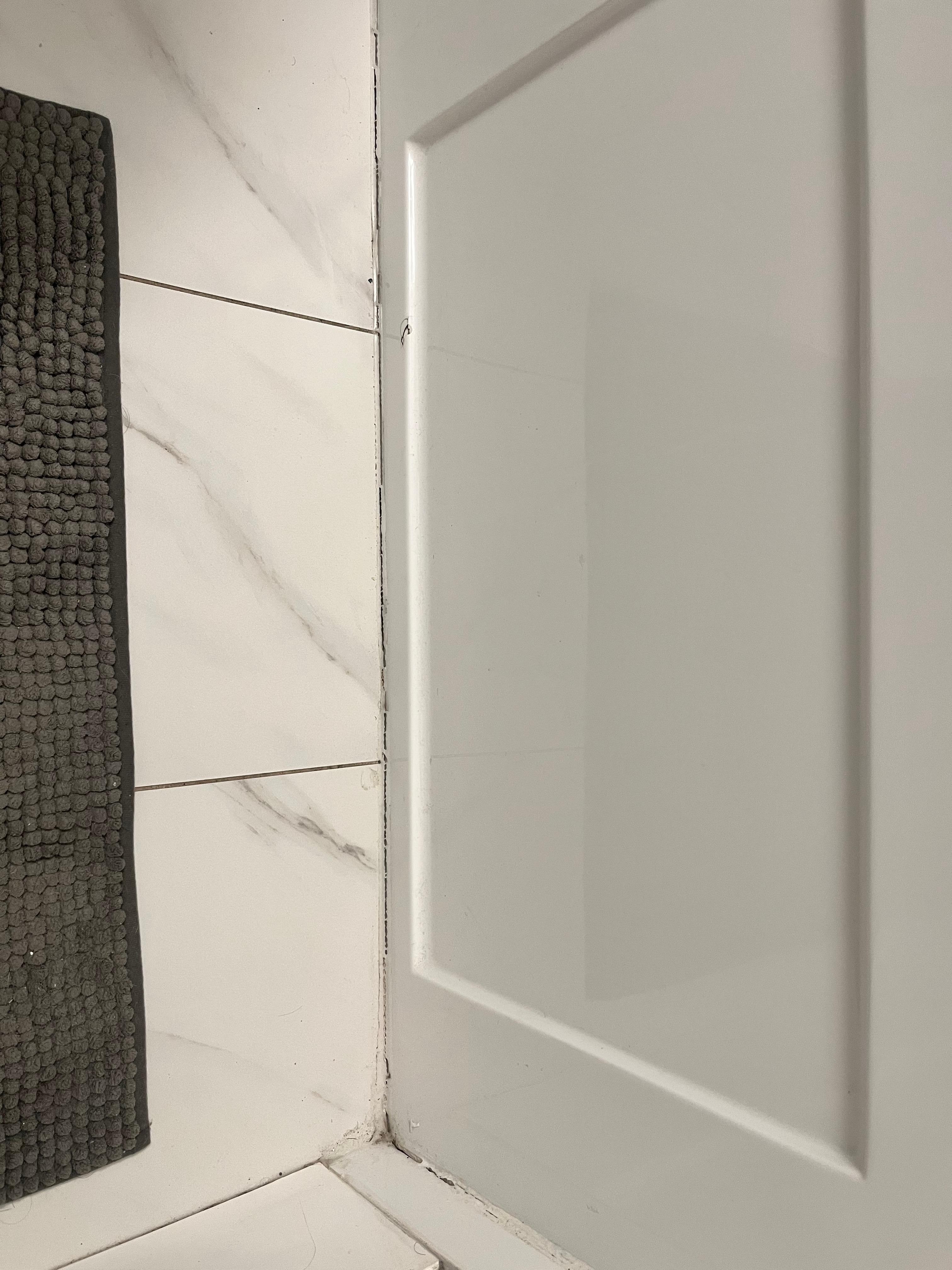 Dirty floor and water damaged grout