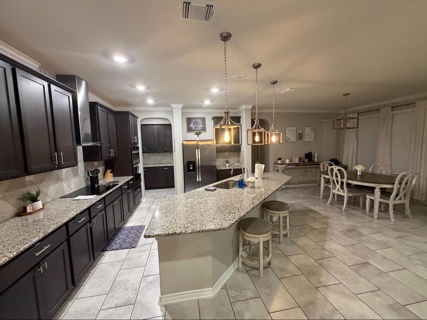 Kitchen / Breakfast Nook: The dishwasher is a lifesaver, and behind that back wall is a pantry as well.