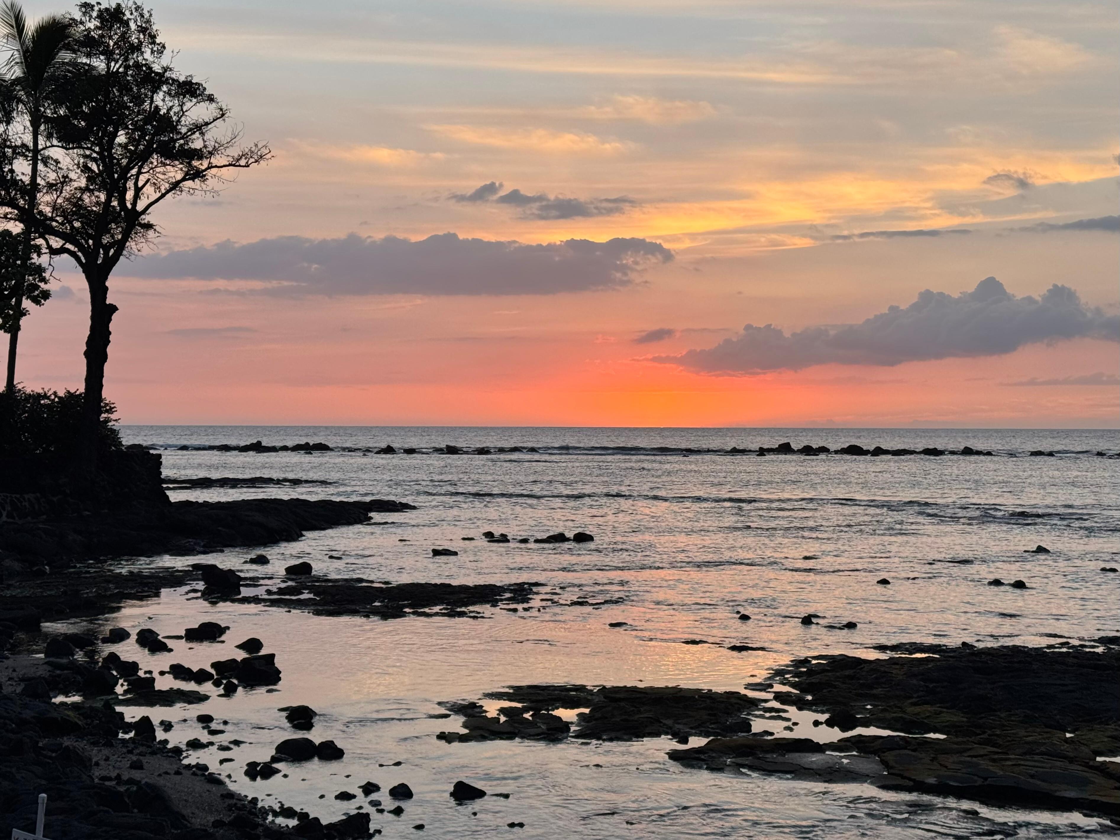Sunset from the beach across the street from the unit.