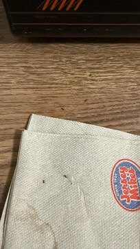 Ants all over our napkins and in front of the microwave