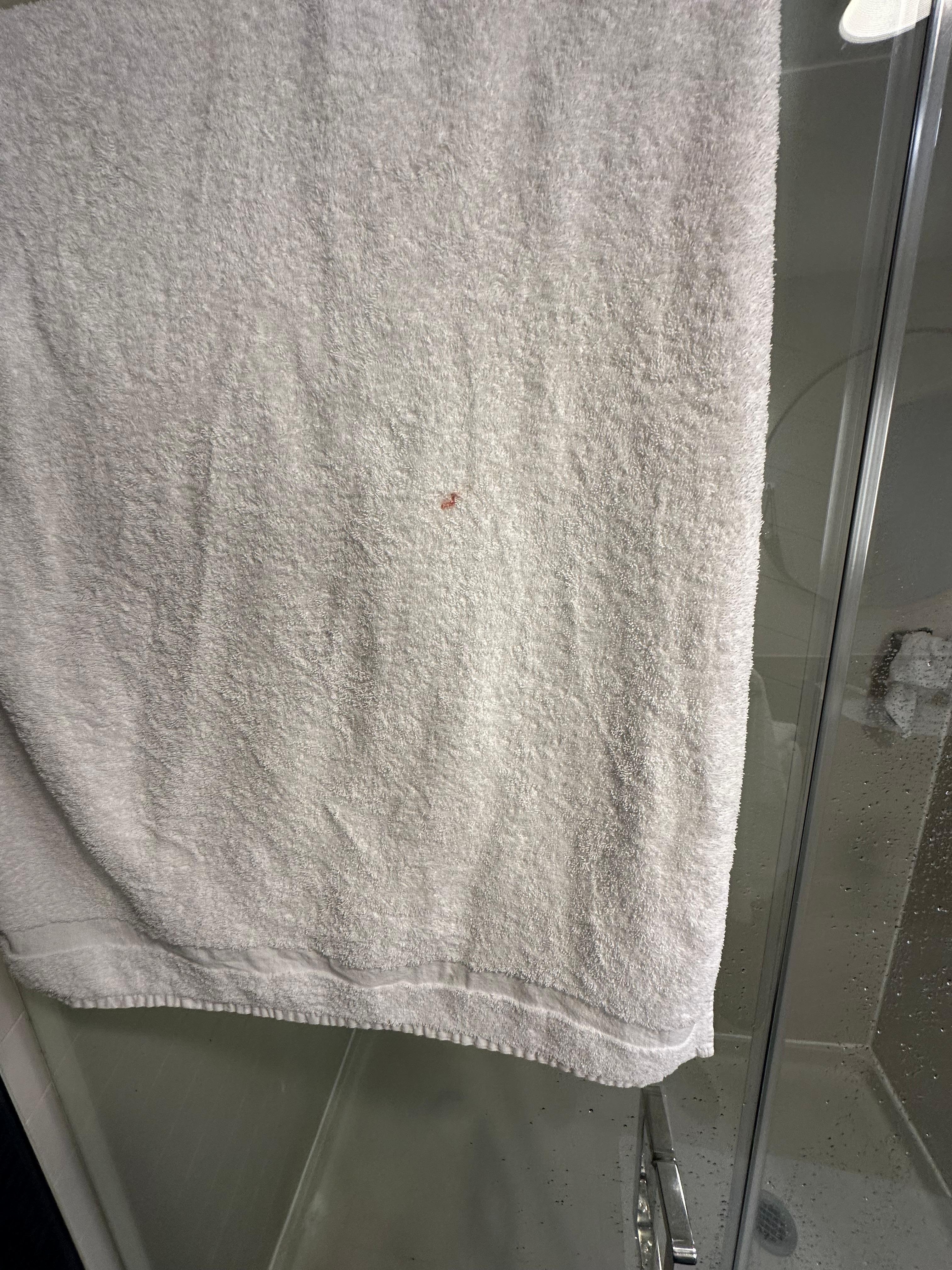 Someone else’s blood on my towel in my faucet