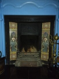 The bedroom fireplace.